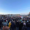 Numerous people at a demonstration against right-wing on the Platz der Deutschen Einheit in Dortmund with the main station in the background